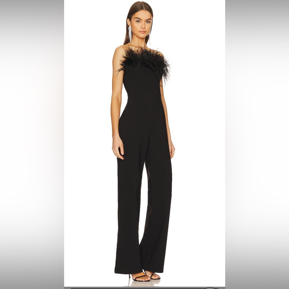 LIKELY jumpsuit black with feather size 00 rare. Fits like a size 0